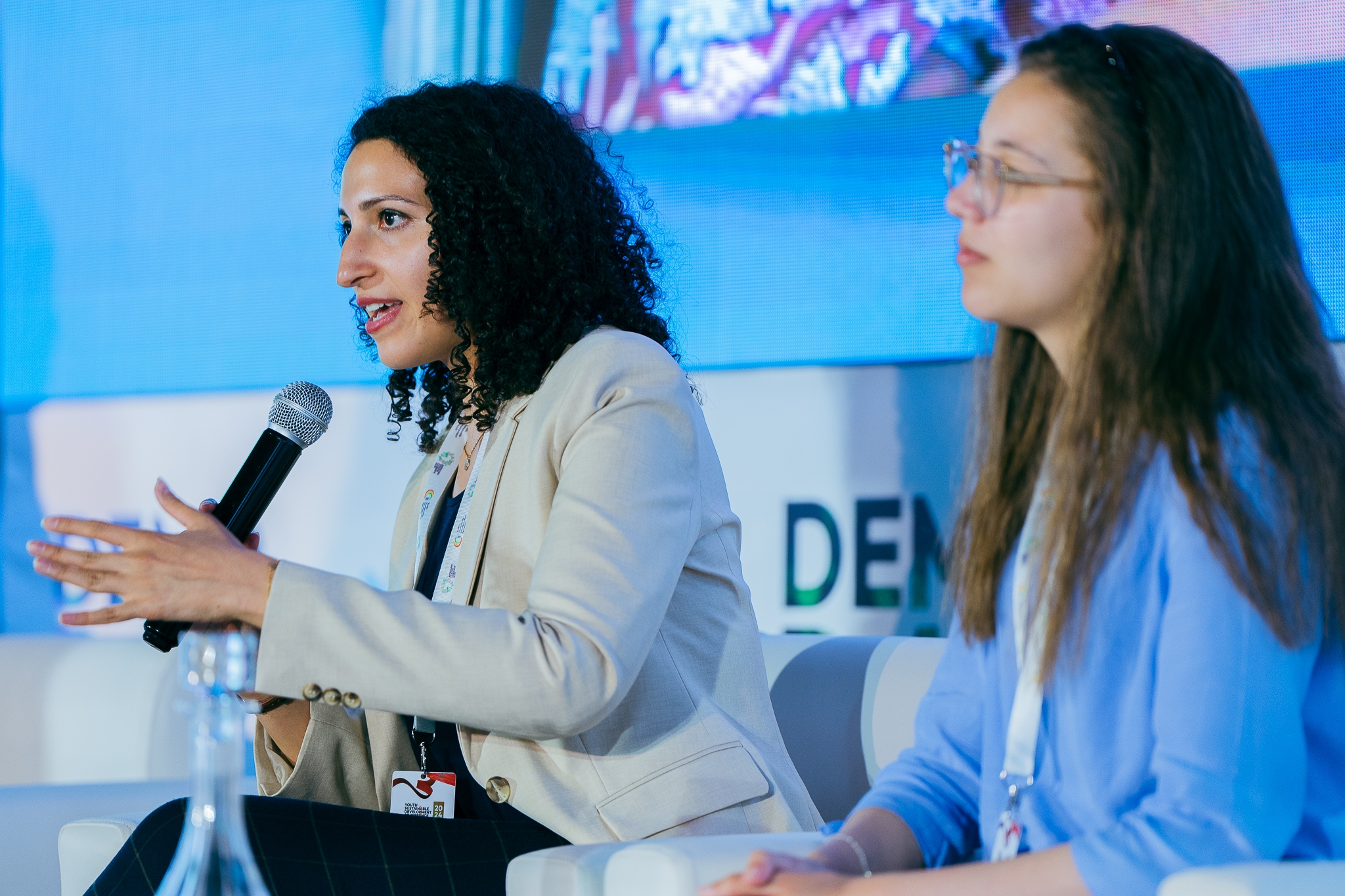 Dr. ElZein (on the left) answering questions about Rwanda sustainability initiatives